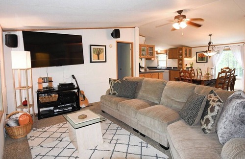 Vian Cabin | Accommodating up to 12 people w/3 bedrooms, 2 bathrooms & a super-sized firepit.