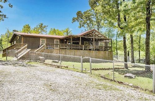 Vian Cabin | Accommodating up to 12 people w/3 bedrooms, 2 bathrooms & a super-sized firepit.