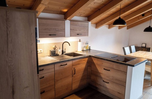 Marquartstein Apartment | Achentaler Alpentor 54 m² for 2-4 persons, eat-in kitchen, bedroom, shower/WC, balcony, WLAN