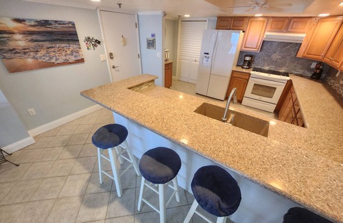 Ormond-by-the-Sea Condo | Actually on the beach! Step off balcony onto the beach & pool! Rare Find!