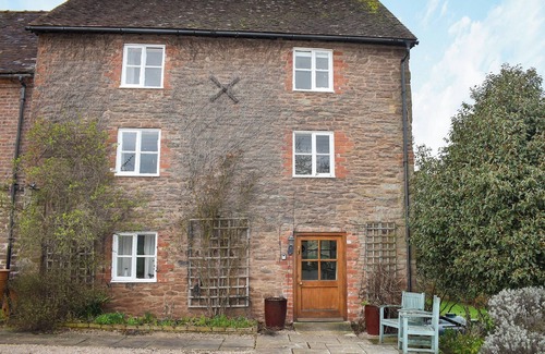 Tenbury Wells Cottage | Adorned with beams throughout.