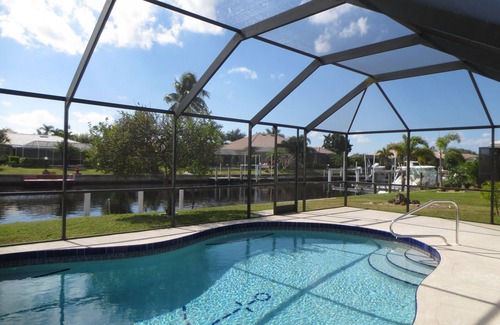 Punta Gorda House | Affordable luxury pool home on deep water canal.