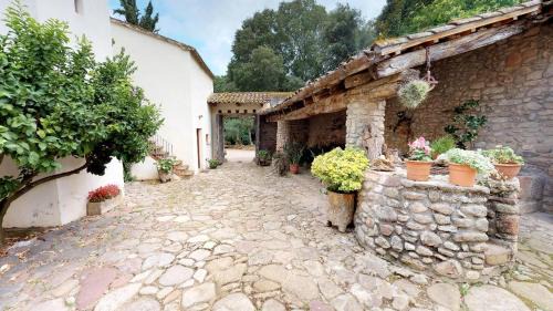 Santa Eulalia de Roncana Apartment | Agroturisme Can Burguès