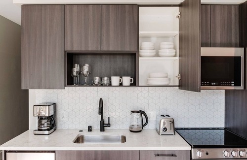 Squire Park Apartment | Airy First Hill Jr 1BR w/Gym, Roof Lounge, W/D & Games, by Blueground