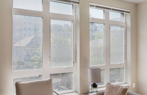 Squire Park Apartment | Airy First Hill Jr 1BR w/Gym, Roof Lounge, W/D & Games, by Blueground