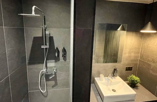 Centre Sud House | Alfred Suites is an elegant, upscale residence ideally located in the vibrant he