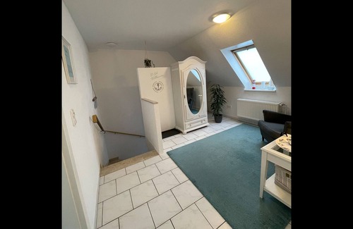 Langwedel Apartment | Almost 100 sqm apartment for up to 6 people. Equipped with: dining room with fireplace, full bath with extra shower, guest toilet, washing machine, dryer, smoke alarms, WLAN, parking space, charging option for e-cars (wallbox), garaging...