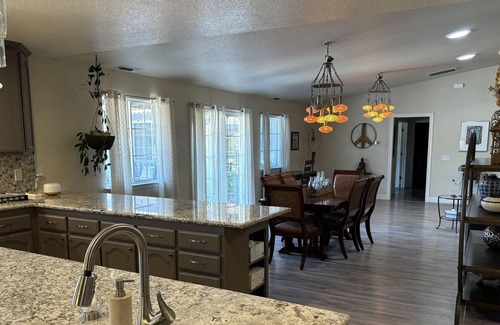 Woodland House | Althea House features a pool, firepit, grilling station, and friendly goats!
