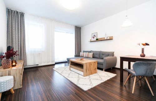 Banska Bystrica Apartment | ALURE RESIDENCES 3 & 24h self check-in, parking in the garage in the apartment building included, new building, terrace, green location with a forest park with a lake, children's playground