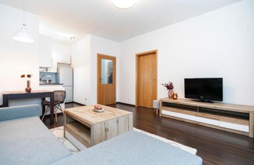 Banska Bystrica Apartment | ALURE RESIDENCES 3 & 24h self check-in, parking in the garage in the apartment building included, new building, terrace, green location with a forest park with a lake, children's playground