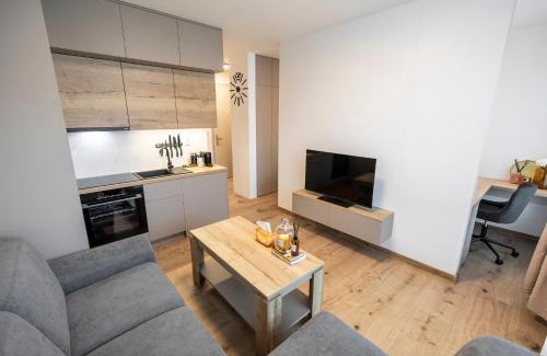 Banska Bystrica Apartment | ALURE RESIDENCES 5 & 24h self check-in, private parking in front of the apartment building included, new building, the apartment building has its own park with a lake and outdoor fitness, children's playground, CITY CENTER
