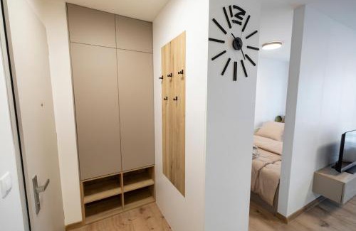 Banska Bystrica Apartment | ALURE RESIDENCES 5 & 24h self check-in, private parking in front of the apartment building included, new building, the apartment building has its own park with a lake and outdoor fitness, children's playground, CITY CENTER