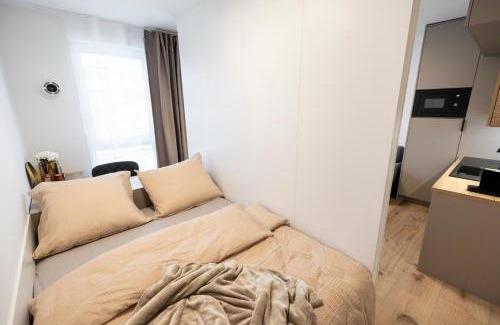 Banska Bystrica Apartment | ALURE RESIDENCES 5 & 24h self check-in, private parking in front of the apartment building included, new building, the apartment building has its own park with a lake and outdoor fitness, children's playground, CITY CENTER