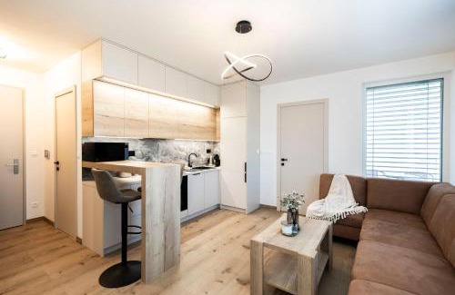 Banska Bystrica Apartment | ALURE RESIDENCES 9 & 24h self check-in, private parking in front of the apartment building included, new building, terrace, the apartment building has its own park with a lake and outdoor fitness, children's playground, CITY CENTER