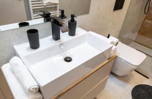 Banska Bystrica Apartment | ALURE RESIDENCES 9 & 24h self check-in, private parking in front of the apartment building included, new building, terrace, the apartment building has its own park with a lake and outdoor fitness, children's playground, CITY CENTER