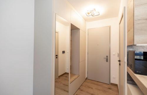 Banska Bystrica Apartment | ALURE RESIDENCES 9 & 24h self check-in, private parking in front of the apartment building included, new building, terrace, the apartment building has its own park with a lake and outdoor fitness, children's playground, CITY CENTER