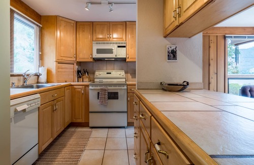 Helios Hills House | Amazing lakefront home with 140-feet of waterfront, WiFi, & enclosed yard