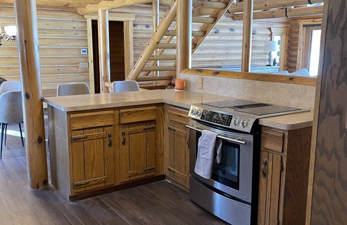 Stacy Cabin | Amazing Log Cabin less than 40 Miles from Twin Cities with large Hot Tub!