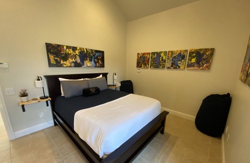 San Martin House | An elegant B&B with a pool & hot tub located above Moose Mountain Vineyards