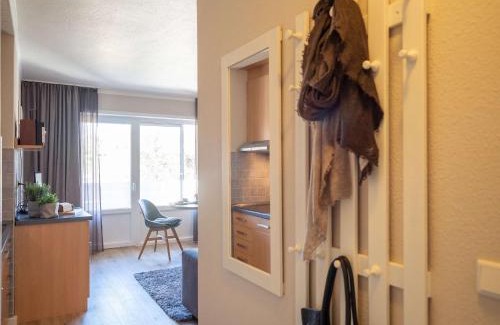 Spiekeroog Apartment | Antares Spiekerooger Gästehaus-Sonnengartenbalkon Nord - Wohnung 5