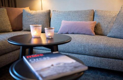 Spiekeroog Apartment | Antares Spiekerooger Gästehaus-Sonnengartenbalkon West - Wohnung 6