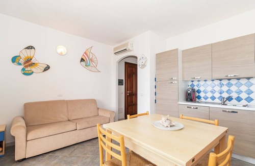 Trinita d'Agultu Apartment | Apartment 'Con Piscina 03' with Sea View, Wi-Fi and Air Conditioning