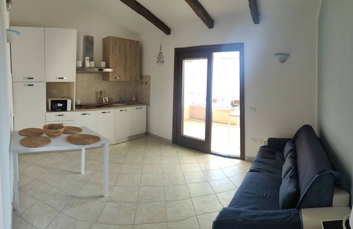 Paduledda Apartment | Apartment 'Sa Suttea Il Mirto' with Sea View, Wi-Fi and Air Conditioning