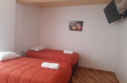 Primero de Mayo Apartment | Apartament 11 people full fourniture with private bathrooms and transport encluded
