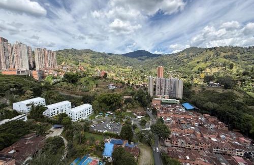Sabaneta Apartment | Apartamento con vista a la montaña, piscina y gym
