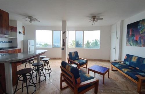 Canoa Apartment | Apartamento con vista a la playa frente al mar