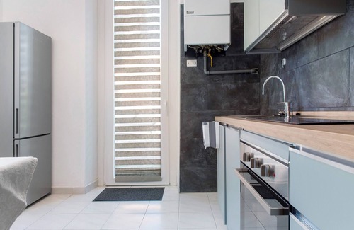 Porto Ceresio Apartment | Apartment 'Casa Maria' with Private Garden and Wi-Fi