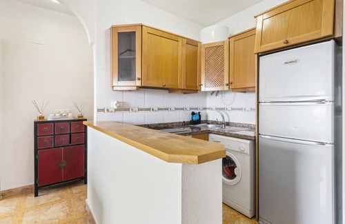 Lo Pagan Apartment | Apartment '1209golfdbeach' with Shared Pool, Wi-Fi and Air Conditioning