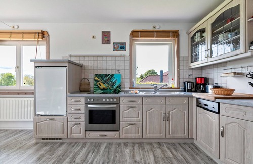 Saustrup Apartment | Apartment 'Ferienwohnung Joerrick' with Private Terrace, Private Garden and Wi-Fi