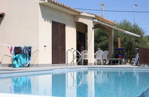 Pianotolli-Caldarello Villa | Apartment in Villa with swimmingpool and garden of 2000mq