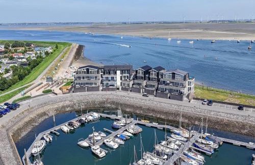 Sint-Annaland Apartment | Apartment in Sint-Annaland with Water Views