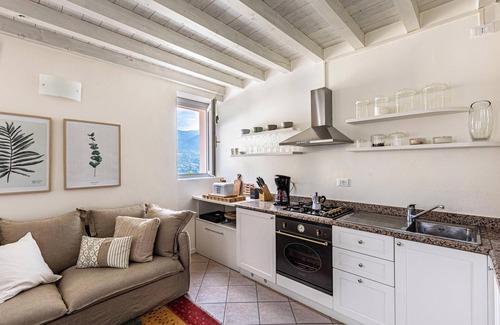 San Felice del Benaco Apartment | Apartment 'Nido Di Cisano' with Lake View, Shared Pool and Wi-Fi