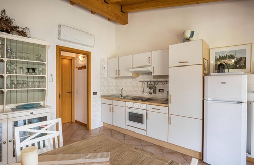 Colà Di Lazise Apartment | Apartment 'Lake Garda-Lazise Colá' with Garden, Shared Pool & A/C