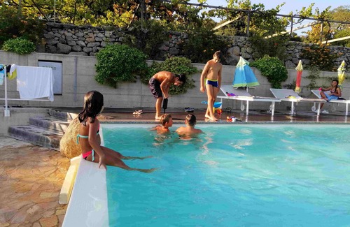 Aglientu Apartment | Apartment 'Li Licci' with Shared Pool, Private Terrace and Air Conditioning