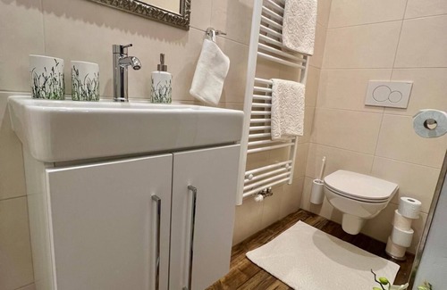 Sankt Johann im Pongau Apartment | Apartment 'Sonnentau' with Shared Pool, Shared Garden and Wi-Fi