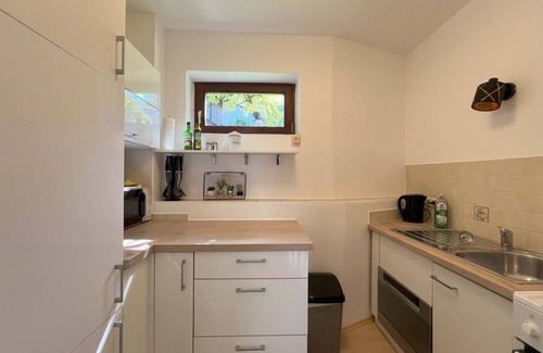 Bad Aussee Apartment | Apartment Theresa | Kitchen | Parking | Garden