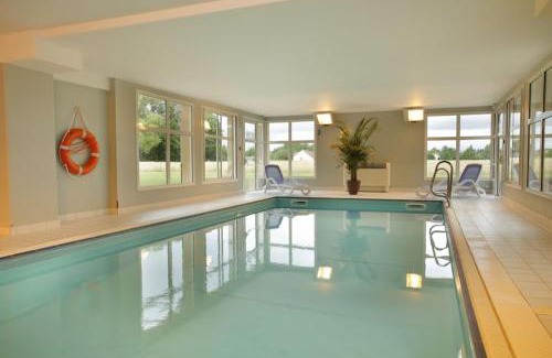Levernois Apartment | Appartement détente, piscine - sauna - vue sur le golf