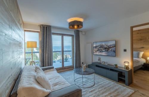 Courchevel Apartment | Appartement Neuf 65m² Courchevel Moriond, 2 Chambres + Cabine, Balcon, Parking Couverts, Skis aux Pieds - FR-1-563-127
