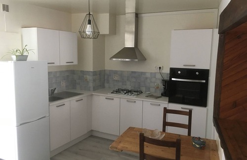 Vogue Apartment | Appt in listed village on river bank, with terrace and barbecue