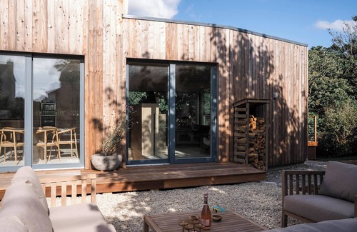 Mount Hawke Villa | Architect's Treetop Retreat Near Beaches, 5 Bed, Infrared Sauna, Cinema & More