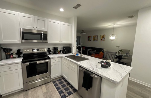 Riverview Condo | Artful Haven: A Stylish Escape