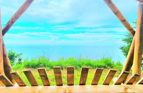 Houghton County Cabin | Artistry view of Lake Superior in authentic cottage will have you refreshed