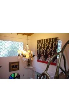 La Estrella Villa | Artsy lush villa with jungle garden in the city