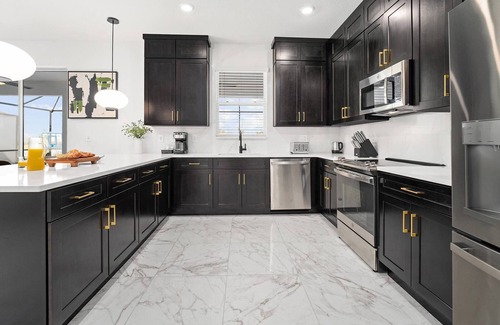 Florida Center House | Astounding Abode | Fabulous home on I-Drive w/an arcade, theater, PVT spa pool