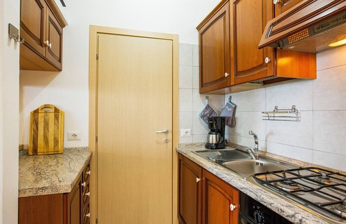 Susello Apartment | Attractive studio with terrace and garden, pool and dream view