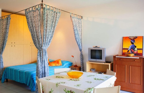 Susello Apartment | Attractive studio with terrace and garden, pool and dream view